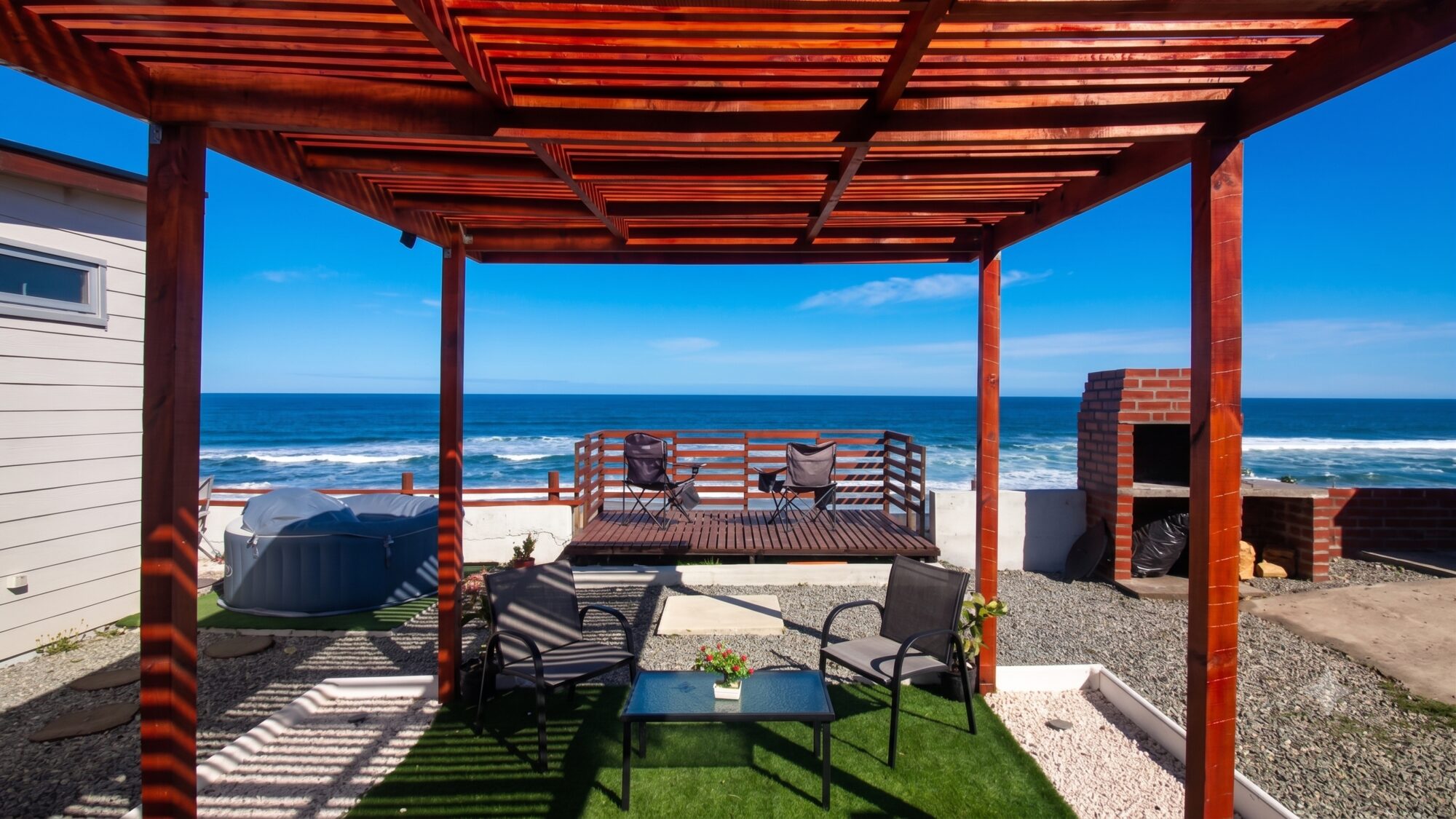 Terraza con vista al mar, Cabañas Aldea de la Hoja